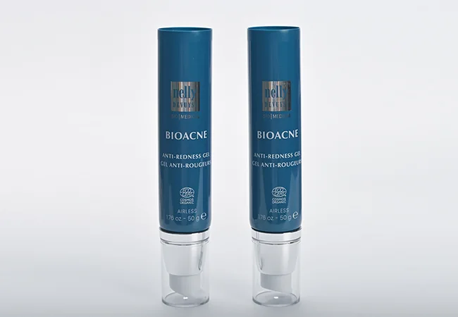 Blue printed cosmetic tubes with metallic-finish shoulders